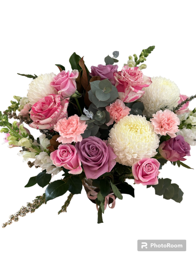 Veronica - A soft pastel bouquet of shades of pink and whites. Flowers include roses, carnations, disbuds and seasonal flowers to compliment