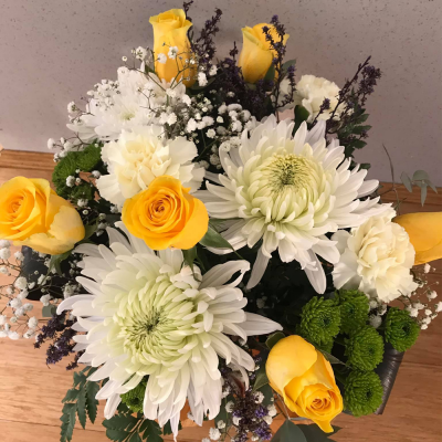 Hello Sunshine - A stunning handtied in water presented in a gif bag/box. Created using yellow roses and white flowers with complimentary foliage. Hand delivered with care in and around Perth by Carramar Flowers & Gifts.