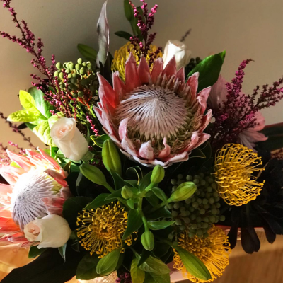 Native Flowers Handtied - A gorgeous native handtied. Created using mostly Australian native flowers with complimentary foliage. Hand delivered with care in and around Perth by Carramar Flowers & Gifts.

Please note fresh Natives/ Proteas are out of season and willuse preserved ones with other fresh flowers.