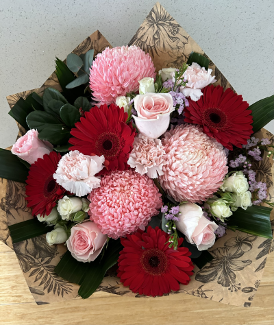 Jasmine - A beautiful bouquet of red, pinks and whites. Perfect for a birthday or anniversary celebration.