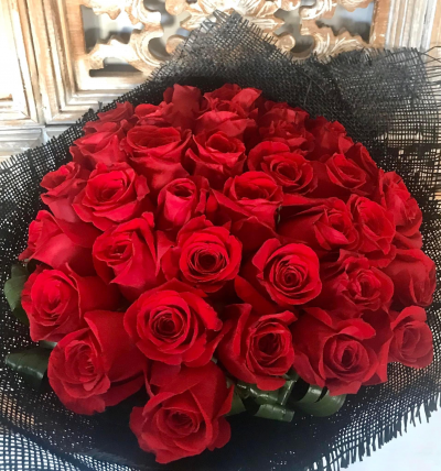 Ruby Rose - 24 premium red roses beautifully arranged in a vase. Perfect for the Anniversary and has a big WOW factor.

A variety of rose colour and sizes are available