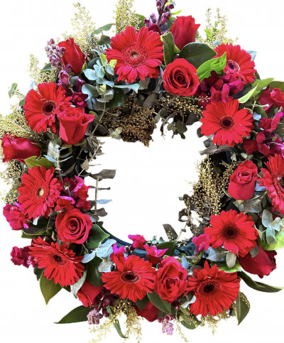 Wreath Red - A bright vibrant Red wreath to farewell your loved one. Variety of flowers  including Roses.