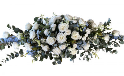 Casket Spray Blue Sky - An elegant casket spray of whites and blues using premium Roses, Delphiums, Carnations.

Custom designed for  client.