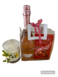 Hamper Bubbles, Chocs and Candles - A perfect add on of Vanilla scented candle, Bubbles and chocolates.

Make their day extra special.