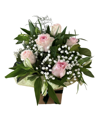 Blushing Rose - A beautiful arrangement of pink roses with Gypsophila and finished off with lush greenery. A perfect gift for Mothers Day