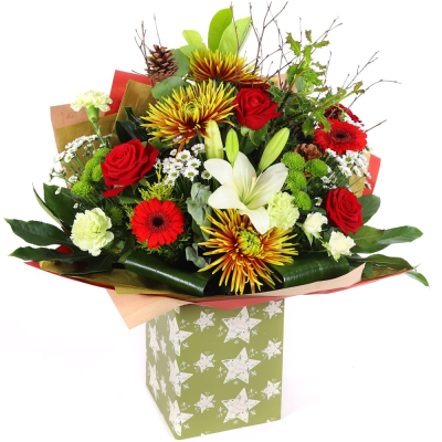 Festive Grandeur - Add a touch of magic to your Christmas gifting with this luxurious bouquet, featuring a blend of red, white, and green flowers adorned with festive additions. Perfectly arranged in a festive-themed box, it's designed to enchant and delight.